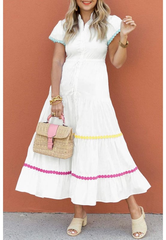 Our styles are designed with a trendy fitted look in mind following an international size standard. For the best fit we suggest choosing one size up from your usual. Be sure to check our sizing chart to find your perfect match!
  White Colorblock Rickrack Trim Short Sleeve Drawstring Waist Long Dress
  Vibrant ensemble with bold colors and cute details
  Rickrack trim for added visual appeal with vintage flair
  Short sleeves and slit neck for a stylish touch
  Drawstring waist for a customizable fit
  Perfect for those who love to stand out in style
Material: 100% Cotton
Size on Tag: S