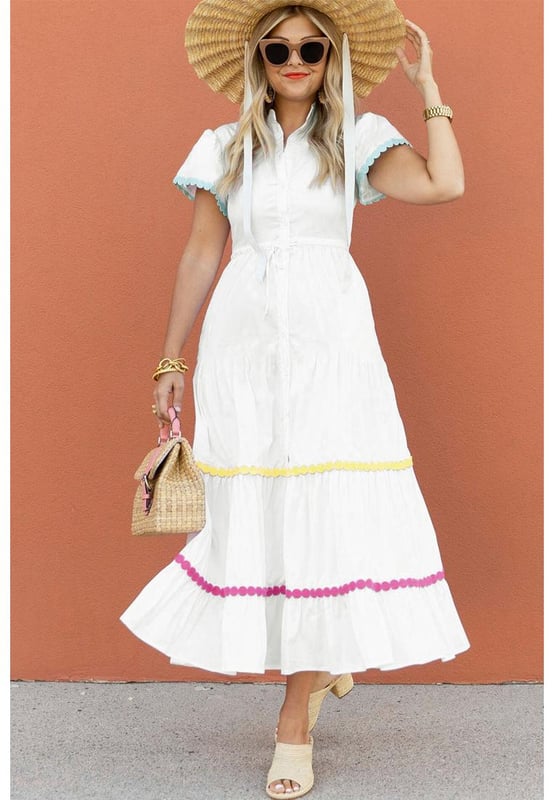 Our styles are designed with a trendy fitted look in mind following an international size standard. For the best fit we suggest choosing one size up from your usual. Be sure to check our sizing chart to find your perfect match!
  White Colorblock Rickrack Trim Short Sleeve Drawstring Waist Long Dress
  Vibrant ensemble with bold colors and cute details
  Rickrack trim for added visual appeal with vintage flair
  Short sleeves and slit neck for a stylish touch
  Drawstring waist for a customizable fit
  Perfect for those who love to stand out in style
Material: 100% Cotton
Size on Tag: S