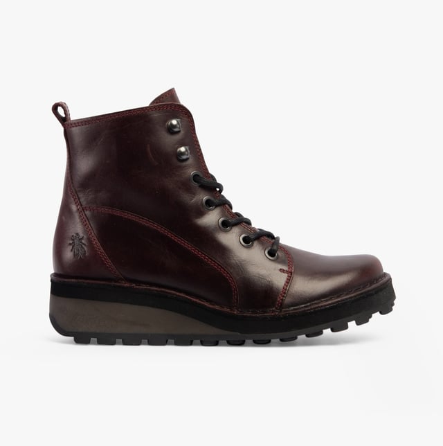Fly London HAZI147FLY Womens Boots Wine Upper Material: LeatherLining Material: MicrofibreSole Material: RubberClosure/Fastening: Lace-UpFeatures: Comfort,BreathableHeel Type: BlockToe Shape: RoundShoe Width: RegularItem Weight: 0.45 KGHeel Height: Medium (5-7.4cm)Shoe Shaft Height: AnkleBoot Style: Ankle BootsGift Boxed: NoProduct Code: P211147005
