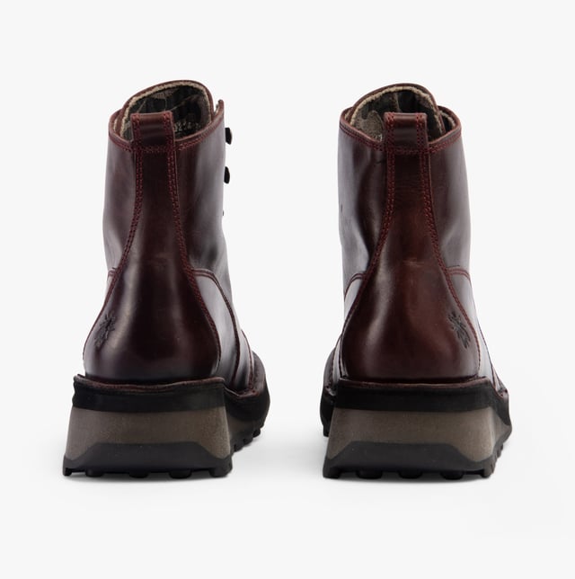 Fly London HAZI147FLY Womens Boots Wine Upper Material: LeatherLining Material: MicrofibreSole Material: RubberClosure/Fastening: Lace-UpFeatures: Comfort,BreathableHeel Type: BlockToe Shape: RoundShoe Width: RegularItem Weight: 0.45 KGHeel Height: Medium (5-7.4cm)Shoe Shaft Height: AnkleBoot Style: Ankle BootsGift Boxed: NoProduct Code: P211147005