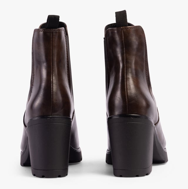 Marco Tozzi 25414-41-304 Womens Boots Mocca Upper Material: Faux LeatherLining Material: TextileSole Material: RubberClosure/Fastening: Pull-OnFeatures: Comfort,Elasticated Side Panel,VeganHeel Type: BlockToe Shape: Chisel/AlmondShoe Width: RegularItem Weight: 0.45 KGHeel Height: High (7.5-9.9cm)Shoe Shaft Height: AnkleBoot Style: Ankle BootsGift Boxed: NoProduct Code: 25414-41-304