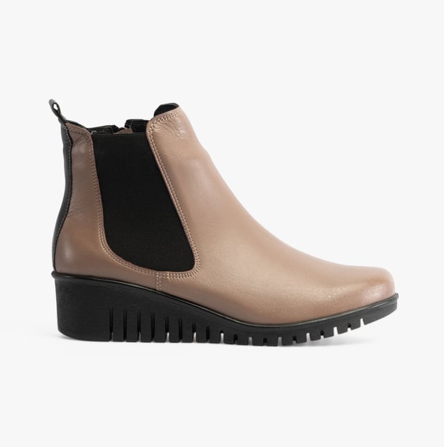 Lotus DRESDEN Womens Boots Clay Upper Material: LeatherLining Material: TextileSole Material: RubberClosure/Fastening: ZipFeatures: Comfort,Elasticated Side PanelHeel Type: WedgeToe Shape: RoundShoe Width: RegularItem Weight: 0.45 KGHeel Height: Low (2.5-4.9cm)Shoe Shaft Height: AnkleBoot Style: Ankle BootsGift Boxed: NoProduct Code: ULB382DC0