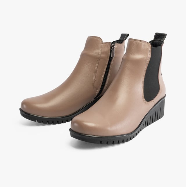 Lotus DRESDEN Womens Boots Clay Upper Material: LeatherLining Material: TextileSole Material: RubberClosure/Fastening: ZipFeatures: Comfort,Elasticated Side PanelHeel Type: WedgeToe Shape: RoundShoe Width: RegularItem Weight: 0.45 KGHeel Height: Low (2.5-4.9cm)Shoe Shaft Height: AnkleBoot Style: Ankle BootsGift Boxed: NoProduct Code: ULB382DC0