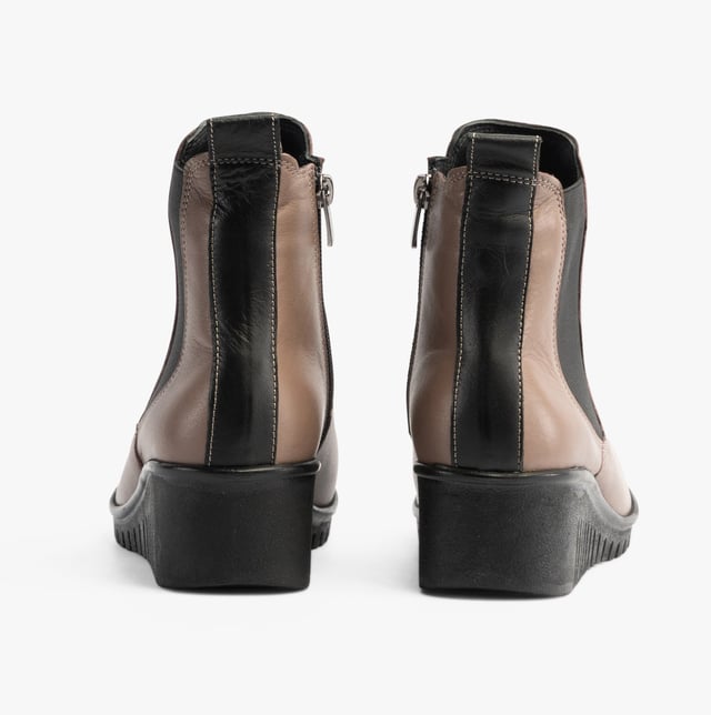 Lotus DRESDEN Womens Boots Clay Upper Material: LeatherLining Material: TextileSole Material: RubberClosure/Fastening: ZipFeatures: Comfort,Elasticated Side PanelHeel Type: WedgeToe Shape: RoundShoe Width: RegularItem Weight: 0.45 KGHeel Height: Low (2.5-4.9cm)Shoe Shaft Height: AnkleBoot Style: Ankle BootsGift Boxed: NoProduct Code: ULB382DC0