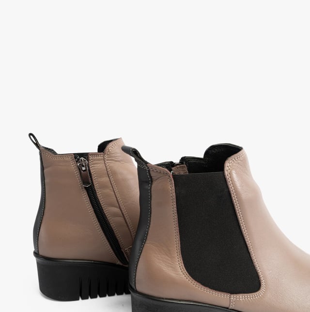 Lotus DRESDEN Womens Boots Clay Upper Material: LeatherLining Material: TextileSole Material: RubberClosure/Fastening: ZipFeatures: Comfort,Elasticated Side PanelHeel Type: WedgeToe Shape: RoundShoe Width: RegularItem Weight: 0.45 KGHeel Height: Low (2.5-4.9cm)Shoe Shaft Height: AnkleBoot Style: Ankle BootsGift Boxed: NoProduct Code: ULB382DC0