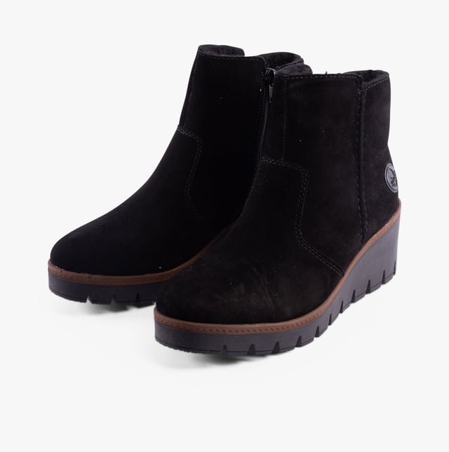 Rieker Rieker Y5065-00 Womens Boots Black Upper Material: SuedeLining Material: TextileSole Material: TPRClosure/Fastening: ZipFeatures: Comfort,Warm LiningHeel Type: WedgeToe Shape: Chisel/AlmondShoe Width: RegularItem Weight: 0 KGHeel Height: Medium (5-7.4cm)Shoe Shaft Height: AnkleBoot Style: Ankle BootsGift Boxed: NoProduct Code: Y5065-00