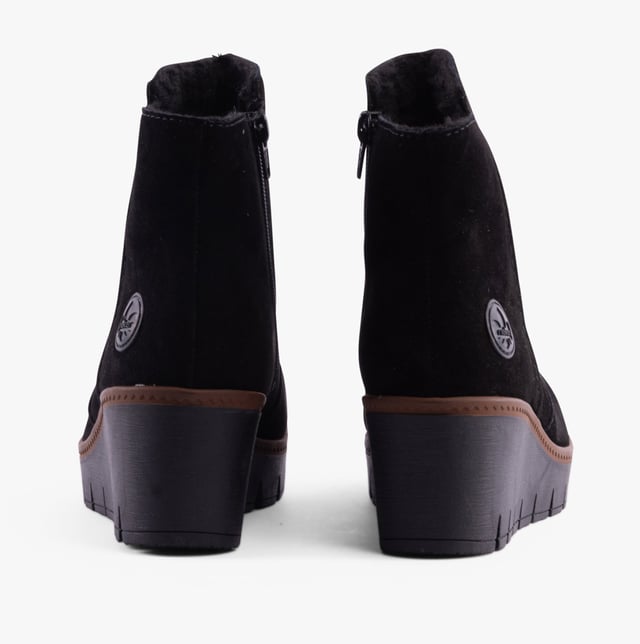Rieker Rieker Y5065-00 Womens Boots Black Upper Material: SuedeLining Material: TextileSole Material: TPRClosure/Fastening: ZipFeatures: Comfort,Warm LiningHeel Type: WedgeToe Shape: Chisel/AlmondShoe Width: RegularItem Weight: 0 KGHeel Height: Medium (5-7.4cm)Shoe Shaft Height: AnkleBoot Style: Ankle BootsGift Boxed: NoProduct Code: Y5065-00