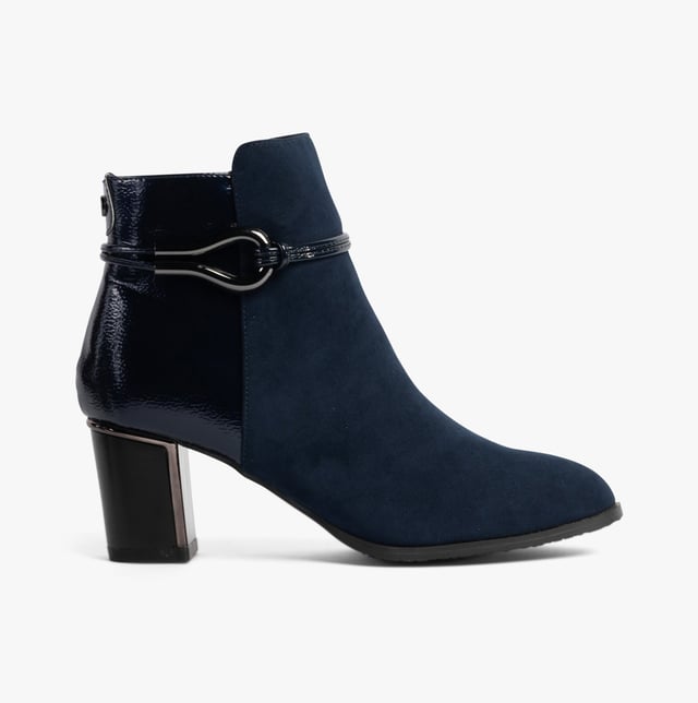 Lotus EBONY Womens Boots Navy Upper Material: SuedeLining Material: TextileSole Material: RubberClosure/Fastening: ZipFeatures: Comfort,BreathableHeel Type: BlockToe Shape: PointShoe Width: RegularItem Weight: 0.45 KGHeel Height: Medium (5-7.4cm)Shoe Shaft Height: AnkleBoot Style: Ankle BootsGift Boxed: NoProduct Code: ULB401DE0