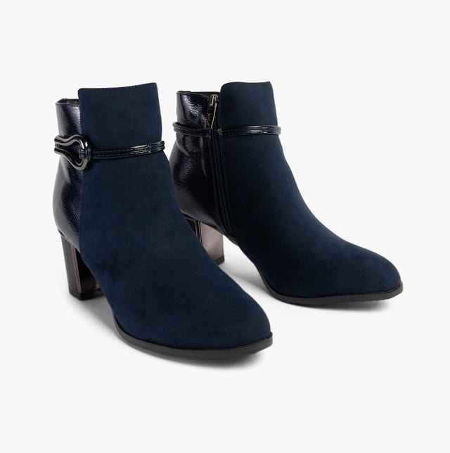 Lotus EBONY Womens Boots Navy Upper Material: SuedeLining Material: TextileSole Material: RubberClosure/Fastening: ZipFeatures: Comfort,BreathableHeel Type: BlockToe Shape: PointShoe Width: RegularItem Weight: 0.45 KGHeel Height: Medium (5-7.4cm)Shoe Shaft Height: AnkleBoot Style: Ankle BootsGift Boxed: NoProduct Code: ULB401DE0