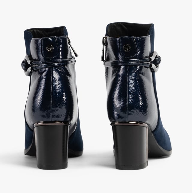 Lotus EBONY Womens Boots Navy Upper Material: SuedeLining Material: TextileSole Material: RubberClosure/Fastening: ZipFeatures: Comfort,BreathableHeel Type: BlockToe Shape: PointShoe Width: RegularItem Weight: 0.45 KGHeel Height: Medium (5-7.4cm)Shoe Shaft Height: AnkleBoot Style: Ankle BootsGift Boxed: NoProduct Code: ULB401DE0