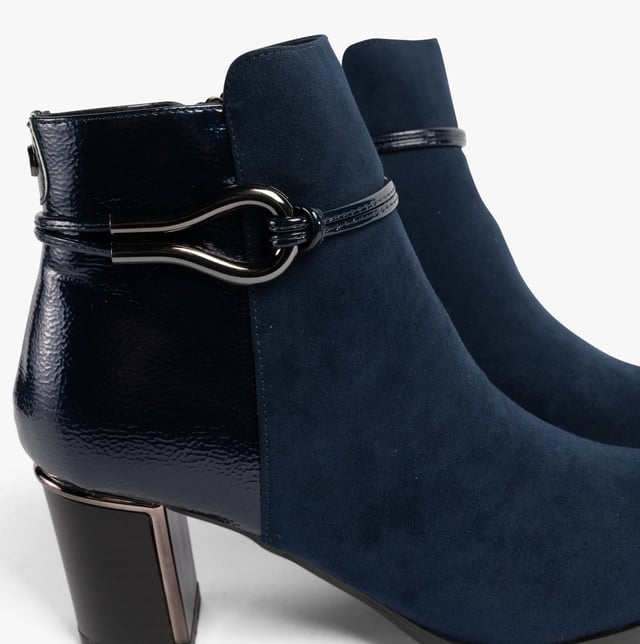 Lotus EBONY Womens Boots Navy Upper Material: SuedeLining Material: TextileSole Material: RubberClosure/Fastening: ZipFeatures: Comfort,BreathableHeel Type: BlockToe Shape: PointShoe Width: RegularItem Weight: 0.45 KGHeel Height: Medium (5-7.4cm)Shoe Shaft Height: AnkleBoot Style: Ankle BootsGift Boxed: NoProduct Code: ULB401DE0