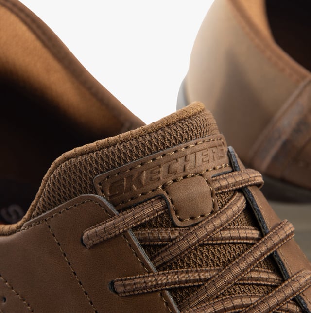 205211/CDB HASTING - RORY Mens Shoes Dark Brown Skechers Skechers 205211/CDB HASTING - RORY Mens Shoes Dark Brown Upper Material: LeatherLining Material: TextileSole Material: RubberClosure/Fastening: Lace-UpFeatures: ComfortToe Shape: RoundShoe Width: RelaxedItem Weight: 0.45 KGHeel Height: Low (2.5-4.9cm)Shoe Shaft Height: Low TopShoe Style: CasualGift Boxed: NoProduct Code: 205211/CDB