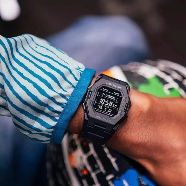 This Casio G-shock Digital Watch for Men is the perfect timepiece to wear or to gift. It's Black  Square case combined with the comfortable Black Plastic watch band will ensure you enjoy this stunning timepiece without any compromise. Operated by a high quality Quartz movement and water resistant to 20 bars, your watch will keep ticking. A compact G-SHOCK in a boldly straight-forward design that moves style into the future.  This Digital watch has a Calendar function: Day-Date as well as Bluetooth , Stop Watch , Countdown , Dual Time and Light High quality 21 cm length and 22 mm width a Black Plastic strap with a Buckle Case measurement: 41 X 41 mm,case thickness: 11 mm, case colour: Black and dial colour: Black