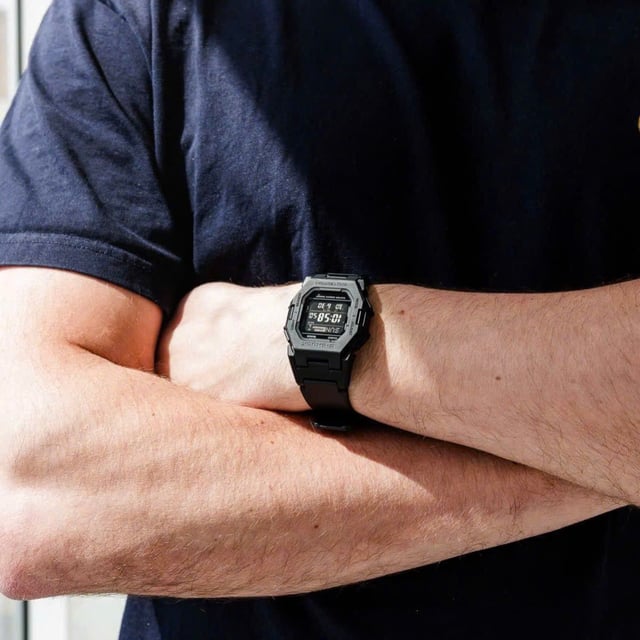 This Casio G-shock Digital Watch for Men is the perfect timepiece to wear or to gift. It's Black  Square case combined with the comfortable Black Plastic watch band will ensure you enjoy this stunning timepiece without any compromise. Operated by a high quality Quartz movement and water resistant to 20 bars, your watch will keep ticking. A compact G-SHOCK in a boldly straight-forward design that moves style into the future.  This Digital watch has a Calendar function: Day-Date as well as Bluetooth , Stop Watch , Countdown , Dual Time and Light High quality 21 cm length and 22 mm width a Black Plastic strap with a Buckle Case measurement: 41 X 41 mm,case thickness: 11 mm, case colour: Black and dial colour: Black