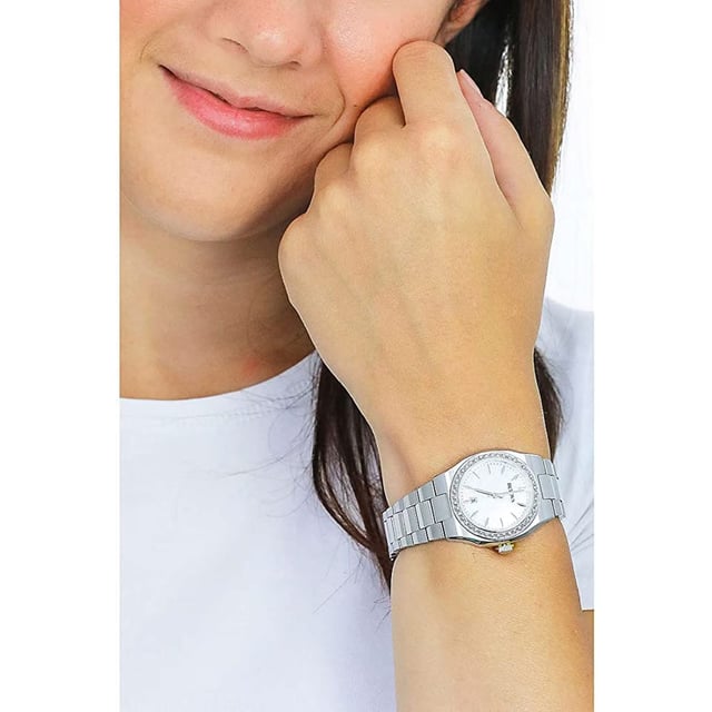This Bulova Surveyor Analogue Watch for Women is the perfect timepiece to wear or to gift. It's Silver 31 mm Round case combined with the comfortable Silver Stainless steel watch band will ensure you enjoy this stunning timepiece without any compromise. Operated by a high quality Quartz movement and water resistant to 3 bars, your watch will keep ticking. A classic women's watch that will never go out of style from our Surveyor collection, with an added hint of sparkle. This Analogue watch has a Calendar function: Date and has a Stone settings bezel. High quality 19 cm length and 18 mm width Silver Stainless steel strap with a Deployment clasp Case diameter: 31 mm, case thickness: 8 mm, case colour: Silver and dial colour: Mother of pearl