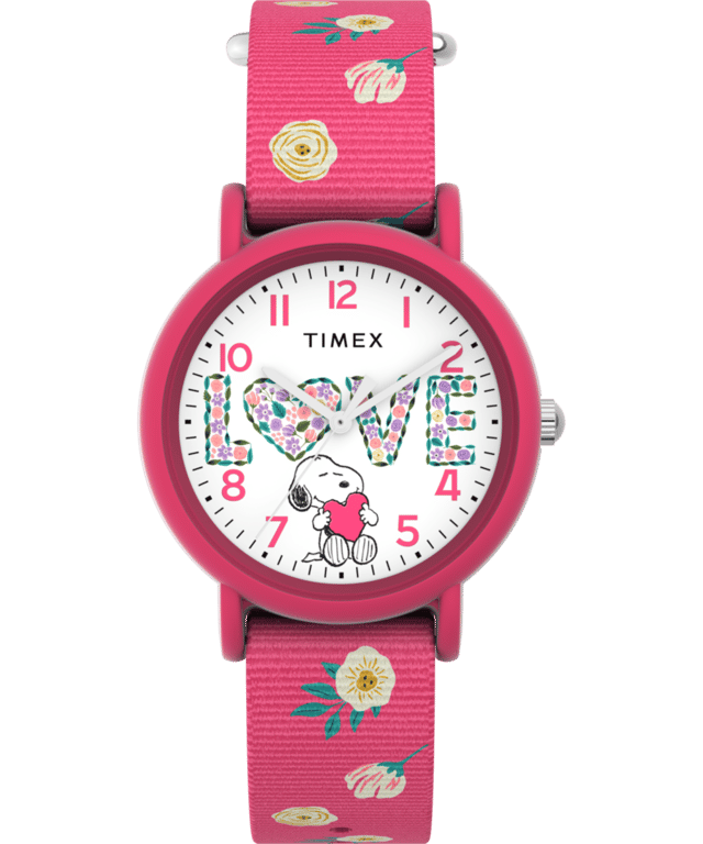 This Timex Peanuts Weekender Color Rush Analogue Watch for Girls is the perfect timepiece to wear or to gift. It's Pink 34 mm Round case combined with the comfortable Pink Fabric watch band will ensure you enjoy this stunning timepiece without any compromise. Operated by a high quality Quartz movement and water resistant to 3 bars, your watch will keep ticking. With its 34mm case, our Timex Color Rush x Peanuts® watch is just the right size for the little Peanuts fan in your life. High quality 17 cm length and 16 mm width a Pink Fabric strap with a Buckle Case diameter: 34 mm,case thickness: 9 mm, case colour: Pink and dial colour: White