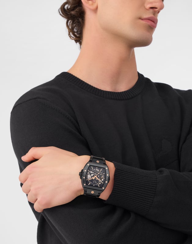 This Philipp Plein The $keleton2.0 Analogue Watch for Men is the perfect timepiece to wear or to gift. It's Black 44 mm Tonneau case combined with the comfortable Black Stainless steel watch band will ensure you enjoy this stunning timepiece without any compromise. Operated by a high quality Automatic movement and water resistant to 5 bars, your watch will keep ticking. Feel the inferno on your wrist. High quality 21 cm length and 18.5 mm width Black Stainless steel strap with a Deployment clasp Case diameter: 44 mm,case thickness: 12.8 mm, case colour: Black and dial colour: Black