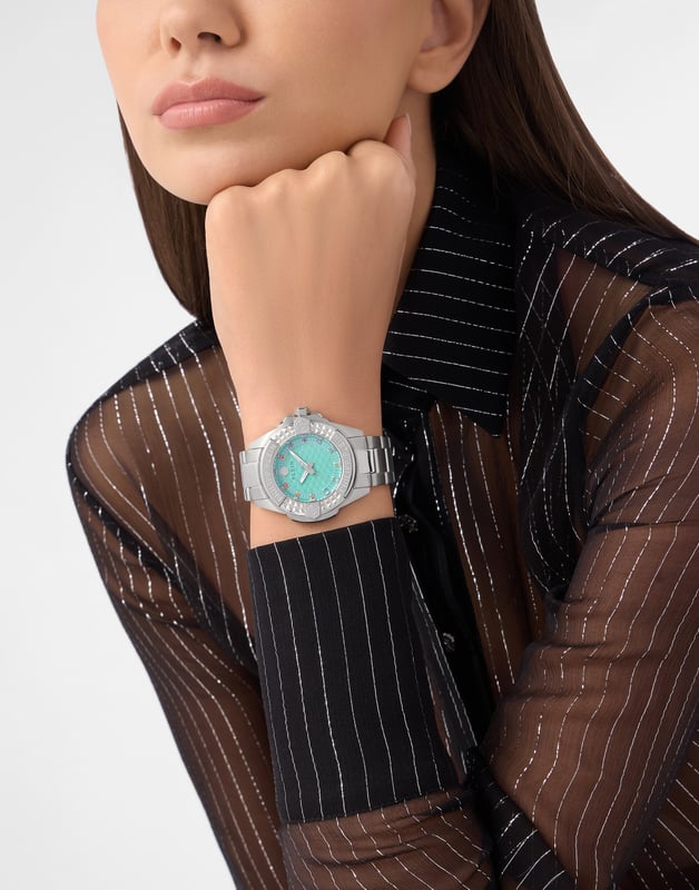This Philipp Plein Plein Majesty Analogue Watch for Women is the perfect timepiece to wear or to gift. It's Silver 38 mm Round case combined with the comfortable Silver Stainless steel watch band will ensure you enjoy this stunning timepiece without any compromise. Operated by a high quality Quartz movement and water resistant to 5 bars, your watch will keep ticking. The Plein Majesty is ready to conquer the feminine universe. This Analogue watch has a function: Luminous Hands High quality 19 cm length and 20 mm width Silver Stainless steel strap with a Deployment clasp Case diameter: 38 mm,case thickness: 9.5 mm, case colour: Silver and dial colour: Blue