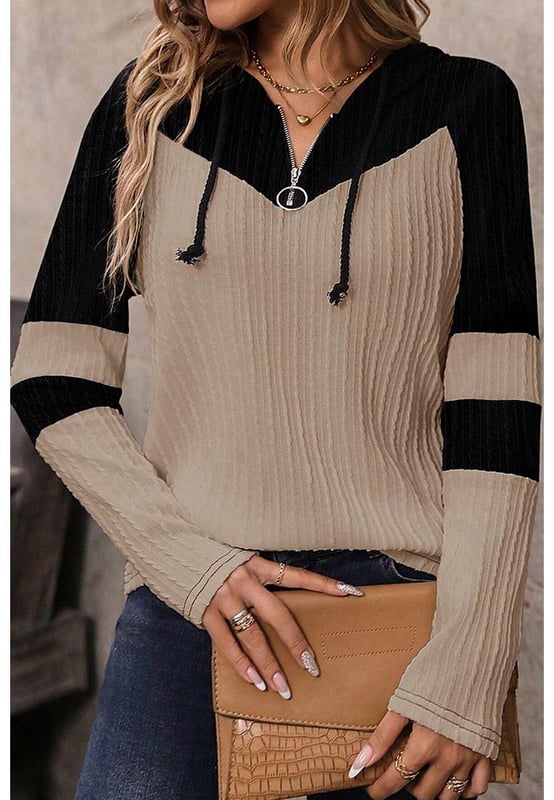 Textured knit adds visual interest and unique feel
  Colorblock design for a striking contrast and modern aesthetic
  Quarter zip for adjustable ventilation and customizable fit
  Drawstring hood for added warmth and sporty touch
Material: 95% Polyester 5% Elastane