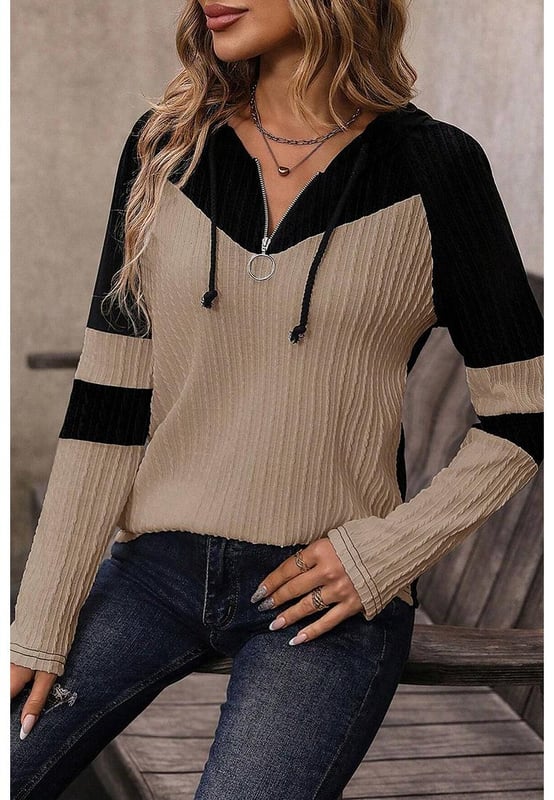Textured knit adds visual interest and unique feel
  Colorblock design for a striking contrast and modern aesthetic
  Quarter zip for adjustable ventilation and customizable fit
  Drawstring hood for added warmth and sporty touch
Material: 95% Polyester 5% Elastane