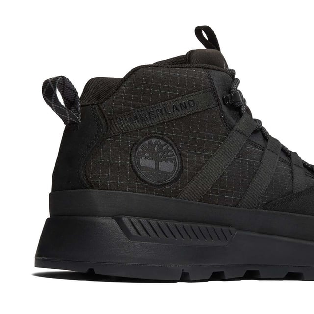 Mens Timberland Euro Trekker Low Lace-Up Trainers in black.- ReBOTL™ fabric upper.- Lace fastening.- Pull tab.- Timberland branding.- Compression molded EVA blend foam sole.- Lightweight OrthoLite® foam footbed.- Rubber Sole Brush.- Ref: 0A5UWW0011