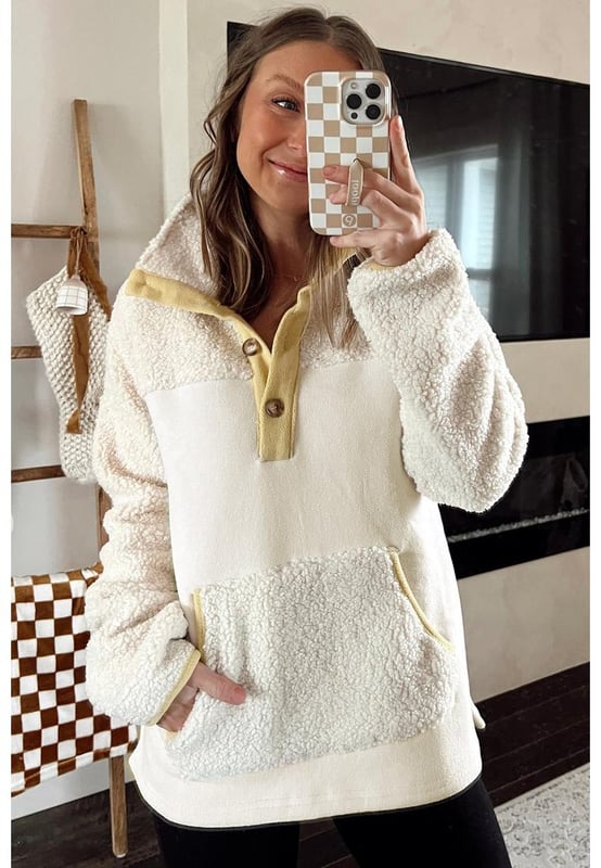 High
  quality teddy and fleece textures
  Casual fit silhouette
  Henley style buttons
  Kangaroo pocket
  Contrast trim for a pop of color
  Pairs well with fashion jeans and casual sweatpants
Material: 100% Polyester