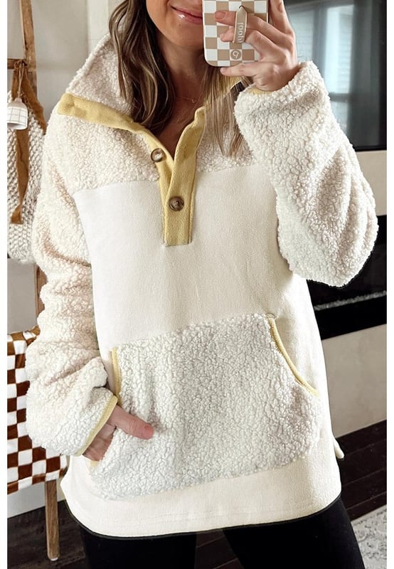 High
  quality teddy and fleece textures
  Casual fit silhouette
  Henley style buttons
  Kangaroo pocket
  Contrast trim for a pop of color
  Pairs well with fashion jeans and casual sweatpants
Material: 100% Polyester