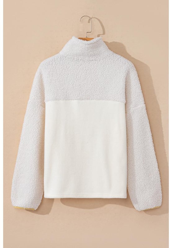 High
  quality teddy and fleece textures
  Casual fit silhouette
  Henley style buttons
  Kangaroo pocket
  Contrast trim for a pop of color
  Pairs well with fashion jeans and casual sweatpants
Material: 100% Polyester