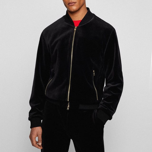 Boss C-Hanry Bomber Jacket in black.- Bomber collar.- Full zip fastening.- Zip pockets.- Ribbed cuffs and hem.- 42% Cotton  32% Polyester  24% Polyamide  2% Elastane.  Hand wash.- Ref: 50465476001