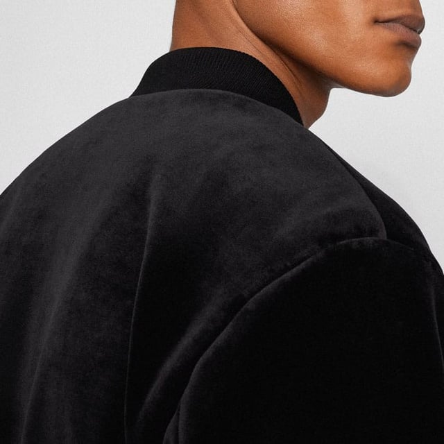 Boss C-Hanry Bomber Jacket in black.- Bomber collar.- Full zip fastening.- Zip pockets.- Ribbed cuffs and hem.- 42% Cotton  32% Polyester  24% Polyamide  2% Elastane.  Hand wash.- Ref: 50465476001