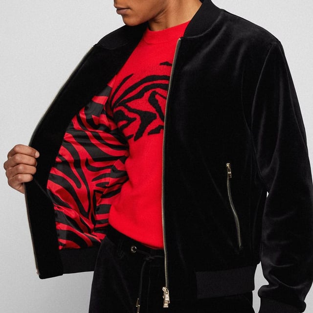 Boss C-Hanry Bomber Jacket in black.- Bomber collar.- Full zip fastening.- Zip pockets.- Ribbed cuffs and hem.- 42% Cotton  32% Polyester  24% Polyamide  2% Elastane.  Hand wash.- Ref: 50465476001