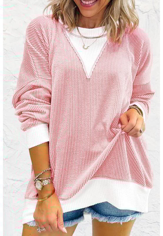 Textured with a corded knit fabric
  Chic and eye
  catching color block design
  Drop shoulder design for a laid
  back look
  Loose fit for all body shapes
  Cozy and comfortable
Material: 75% Polyester 20% Viscose 5% Elastane