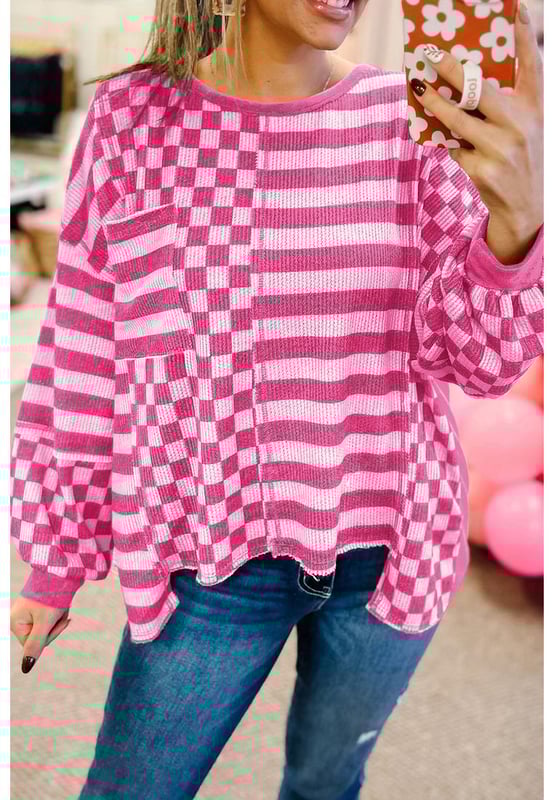 Distinctive checkerboard and striped mixed pattern
  Unique patchwork details
  Voluminous lantern sleeves for a dramatic flair
  High
  low hem and chest pocket for added detail
  Comfortable fit for casual and daily wear
Material: 100% Polyester