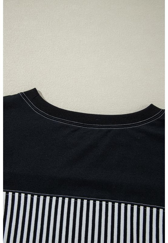 Black and white striped patchwork design
  Loose t
  shirt fit
  Timeless striped pattern
  Versatile 3/4 sleeves
  Perfect for transitional seasons
  Available in plus sizes
  Check size chart for the perfect fit
Material: 95% Cotton 5% Elastane