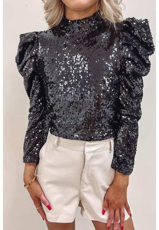 Black Sequin Mock Neck Bubble Sleeve Top
  Sleek black color with sequin embellishments
  Contemporary mock neck design
  Playful bubble sleeves
  Made from high
  quality materials
  Suitable for both men and women
  Versatile piece for various occasions