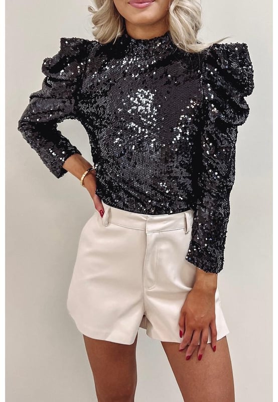 Black Sequin Mock Neck Bubble Sleeve Top
  Sleek black color with sequin embellishments
  Contemporary mock neck design
  Playful bubble sleeves
  Made from high
  quality materials
  Suitable for both men and women
  Versatile piece for various occasions