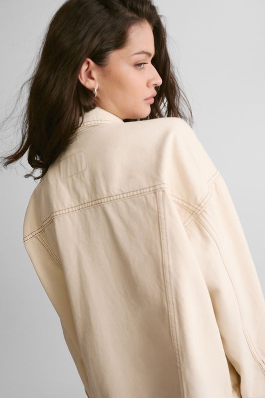 Boxy, oversized fit for a relaxed and trendy silhouette
        Classic denim construction with sturdy button-up front
        Functional chest pockets for added utility and style
        Versatile design suitable for layering over various outfits
        Timeless collar detail for a polished finish
    
    The Oversized Denim Jacket from NastyGal is a wardrobe essential that effortlessly combines comfort with style. This boxy-fit jacket offers a contemporary twist on a classic design, perfect for those seeking a relaxed yet fashionable look. The versatile nature of this piece allows for endless styling possibilities, making it a go-to choice for casual outings and laid-back events. Pair it with wide-leg trousers and chunky trainers for a trendy daytime ensemble, or throw it over a midi dress for a chic contrast at family gatherings. The jacket's roomy silhouette makes it ideal for layering over jumpers during cooler months, while its timeless appeal ensures it will remain a staple in your wardrobe for seasons to come. Whether you're heading to a casual brunch or a relaxed evening with friends, this NastyGal denim jacket will add an effortless cool to any outfit.