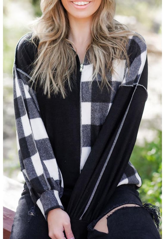 Unisex Black Checkboard Patchwork Exposed Stitching Collared Top
  Features a unique black checkboard patchwork design
  Exposed stitching adds edginess to the design
  Made from high
  quality materials
  Versatile piece that can be worn for both formal and casual occasions