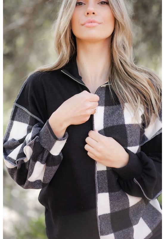 Unisex Black Checkboard Patchwork Exposed Stitching Collared Top
  Features a unique black checkboard patchwork design
  Exposed stitching adds edginess to the design
  Made from high
  quality materials
  Versatile piece that can be worn for both formal and casual occasions