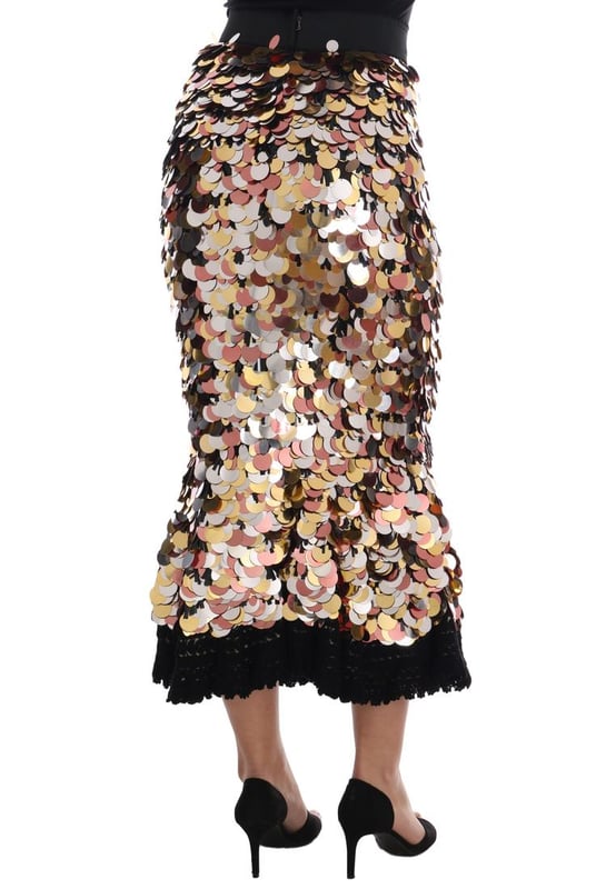 Marca: Dolce & Gabbana.
  Estilo: Cintura alta peplum lapiz recto.
  Color: Negro con lentejuelas plateadas bronce y doradas.
  Cierre: Cremallera.
  Cintura: Elastica.
  Forro: Algodon negro elastico.
  Detalles: Logotipo.
  Origen: Made in Italy.
  Artesan.