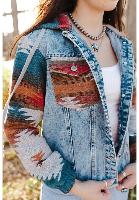 Womens multicolor Aztec print denim jacket
  Frayed hem adds a trendy touch
  Versatile and stylish addition to any wardrobe
  Unique Aztec print design in multiple colors
  High
  quality craftsmanship and attention to detail
Material: 75% Cotton 25% Polyester