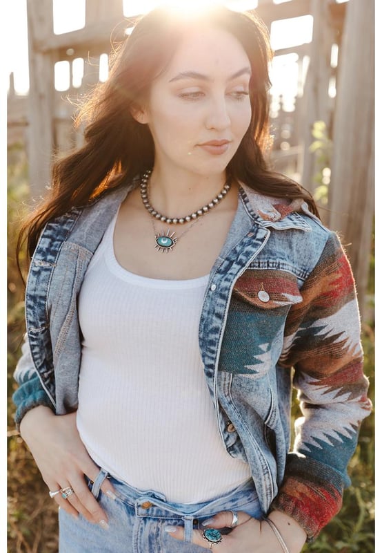 Womens multicolor Aztec print denim jacket
  Frayed hem adds a trendy touch
  Versatile and stylish addition to any wardrobe
  Unique Aztec print design in multiple colors
  High
  quality craftsmanship and attention to detail
Material: 75% Cotton 25% Polyester