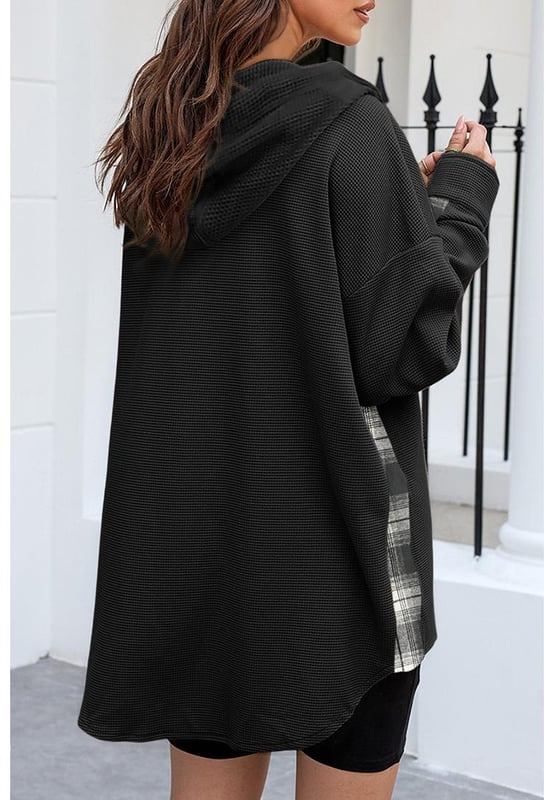 Stylish black plaid design
  Oversized fit for effortless layering
  Hood provides practical and stylish element
  Crafted from cozy waffle knit fabric
  Available in multiple sizes
Material: 95% Polyester 5% Elastane