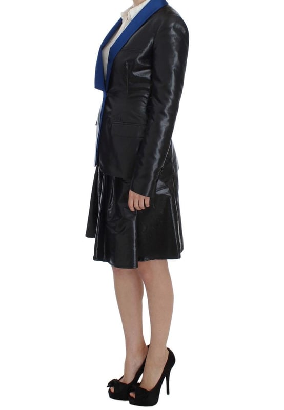 Brand new with tags
  Two
  piece skirt suit
  Made from 100% polyester
  Lining made from 62% viscose and 38% polyester
  Black and blue color scheme
  Skirt with back zipper closure
  Jacket with hook closure
  Logo details
  Made in Italy
Material: polyester