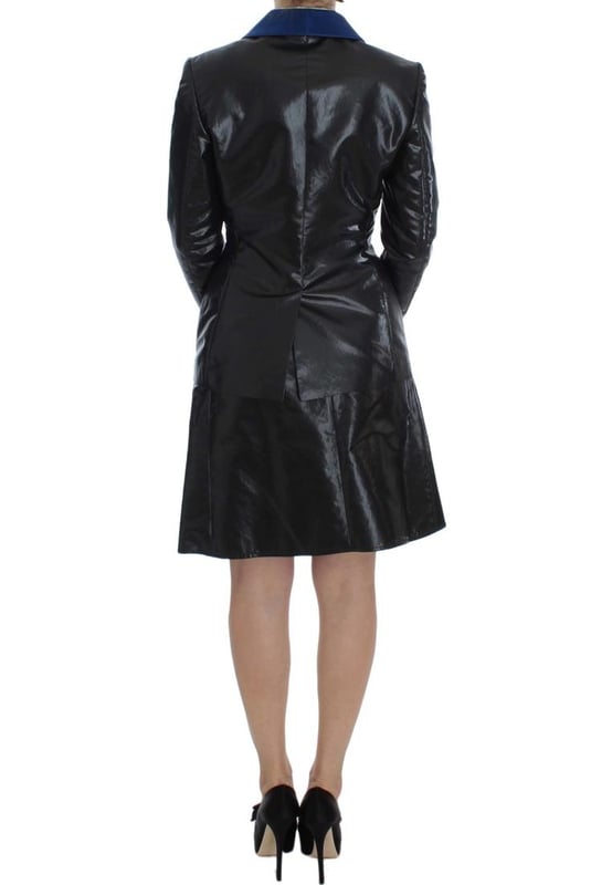 Brand new with tags
  Two
  piece skirt suit
  Made from 100% polyester
  Lining made from 62% viscose and 38% polyester
  Black and blue color scheme
  Skirt with back zipper closure
  Jacket with hook closure
  Logo details
  Made in Italy
Material: polyester