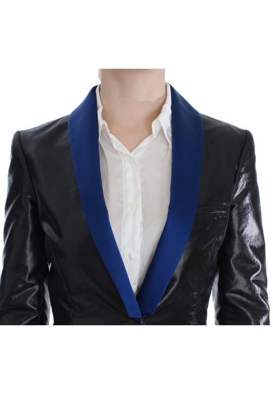Brand new with tags
  Two
  piece skirt suit
  Made from 100% polyester
  Lining made from 62% viscose and 38% polyester
  Black and blue color scheme
  Skirt with back zipper closure
  Jacket with hook closure
  Logo details
  Made in Italy
Material: polyester