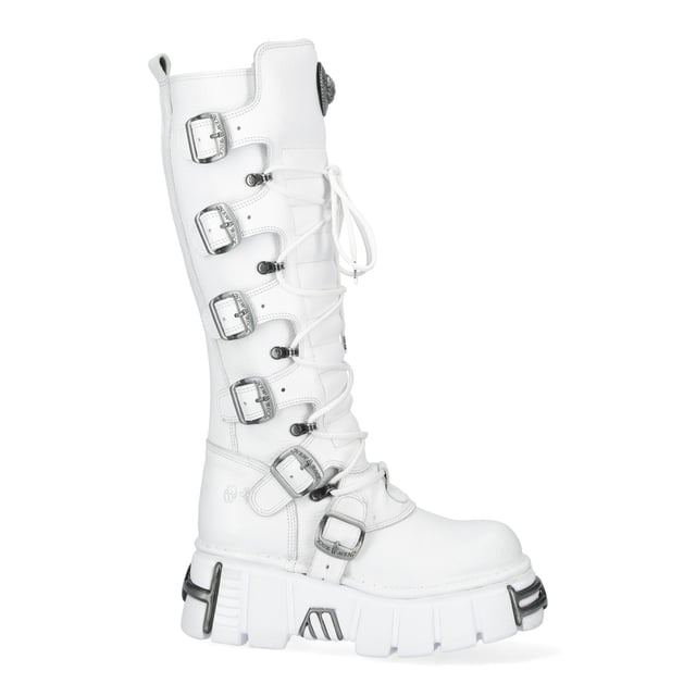 Die kniehohen Stiefel New Rock M-272-C69 aus der Metallic-Kollektion verkörpern mutigen Gothic-Stil mit einem markanten Punk-Rock-Touch. Gefertigt aus hochwertigem Rindsleder mit weicher Kalbsleder-Innenseite, garantieren diese Stiefel Strapazierfähigkeit und Komfort. Mit einem imposanten 7-cm-Absatz und einem 4-cm-Plateau verleihen sie einen eleganten Auftritt. Eine Kombination aus Schnürsenkeln, Reißverschlüssen und Schnallen verbessert sowohl Ästhetik als auch Funktionalität und macht sie zu einer herausragenden Wahl für Fans von Gothic-, Heavy- und Punk-Mode. Hauptmerkmale: Material: Außenmaterial – Rindsleder | Innenmaterial – Kalbsleder Absatzhöhe: 7 cm | Plateauhöhe: 4 cm Sohlenmaterial: PU-ULTRA | Befestigungssystem: Geklebt Verschluss: Schnürsenkel, Reißverschluss, Schnallen Schafthöhe: 37 cm Stil: Gothic, Punk, Heavy, Rock Unisex-Design: Geeignet für alle