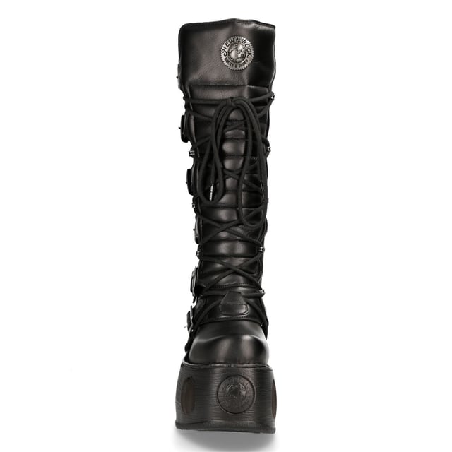New Rock M-272-S2 Neptuno Metallic Knee High Black Leather Gothic Boots The New Rock M-272-S2 Neptuno boots from the Metallic Collection redefine gothic and punk-rock style with their towering design. Crafted from premium black cow leather with a pigskin interior, they offer durability and comfort. The extra-high 38 cm shaft, bold buckles, and signature logo on the tongue add to their fierce aesthetic. Featuring an impressive 11 cm platform heel with distinctive cutouts, these boots are a statement piece for those who embrace alternative fashion.
Key Features:
Material: Outer - Cow Leather | Inner - Pigskin
Heel Height: 11 cm | Platform Height: 9 cm
Sole Material: TPU | Fixing System: Glued
Fastening: Laces & Buckles
Shaft Height: 38 cm
Style: Gothic, Heavy, Punk, Rock
Unisex Design: Suitable for all gernders
Distinctive Details: Buckled shaft, perforated platform, logo on tongue