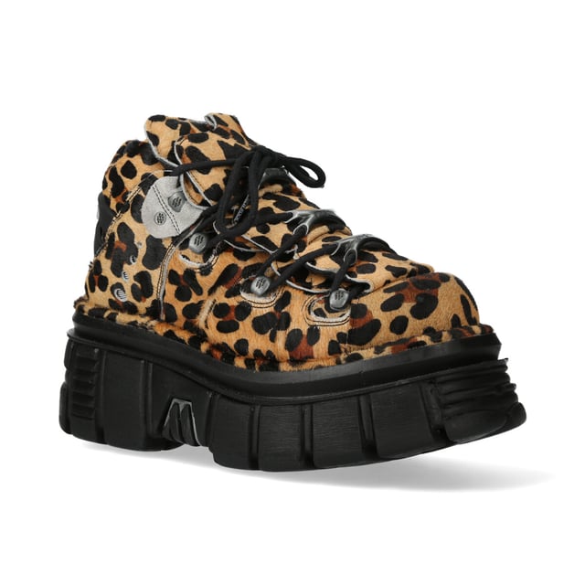 The M-106-C192 from New Rock’s Classic Collection combines a bold urban heavy rock aesthetic with premium craftsmanship. These unisex ankle boots feature a striking brown leapord-print cow leather upper, metal lace hooks, and the brand’s iconic PU-ULTRA platform sole for superior durability and an elevated look.

Key Features:
Material: Outer - Leopard-Print Cow Leather | Inner - Calf Skin
Sole Material: PU-ULTRA | Fixing System: Glued & Sewn
Fastening: Lace-up (Cord)
Heel Height: 6 cm | Platform Height: 4 cm
Shaft Height: 11 cm
Style: Urban, Heavy, Rock, Stylish
Unisex Design: Suitable for all genders