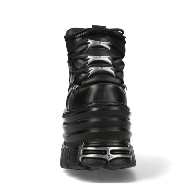 Los botines New Rock M-106-C181 de la Colección Metallic redefinen el calzado gótico y punk con su suela de plataforma ultragruesa. Elaborados en piel de vacuno negra de alta calidad con interior de piel, ofrecen una durabilidad y comodidad superiores. Con un impresionante tacón de 13 cm y una atrevida plataforma de 10 cm, estos botines ofrecen un look distintivo e inconfundible. El diseño con cordones realza su toque rebelde, haciéndolos perfectos para quienes abrazan la moda heavy, punk y rock. Características principales: Material: Exterior: Piel de vacuno | Interior: Piel de cerdo | Altura del tacón: 13 cm | Altura de la plataforma: 10 cm | Material de la suela: PU-ULTRA | Cierre: Cordones (cordón) | Altura de la caña: 10 cm | Estilo: Gótico, Heavy, Punk, Rock | Diseño unisex: Apto para todos los géneros | Suela gruesa: Plataforma extragrande para una estética atrevida y vanguardista